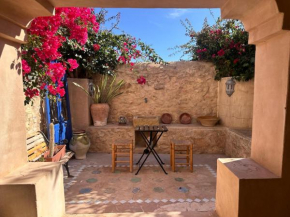 Casa con vistas al mar y Patio de Buganvillas